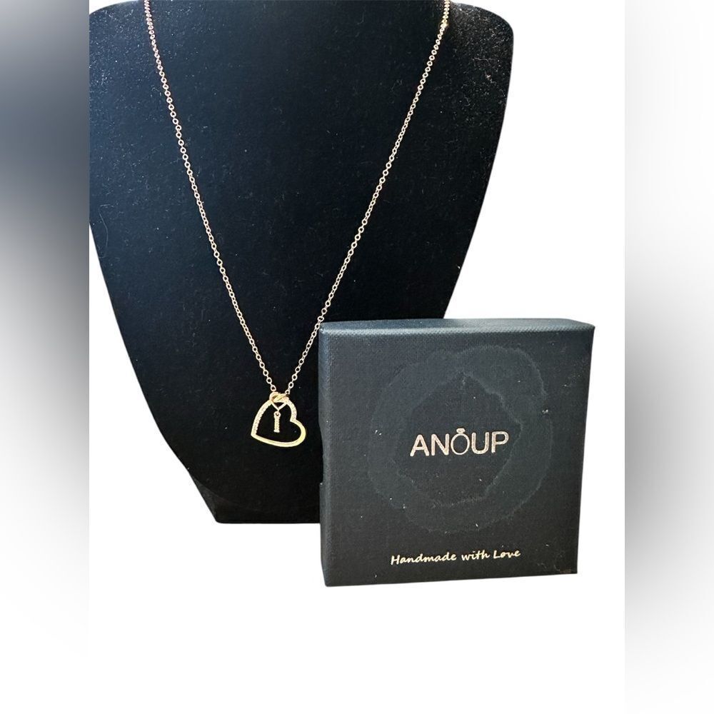 Anoup Rose Gold “I” initial necklace.